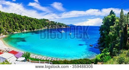 Best beaches of Alonissos island - tranquil organized Milia. Sporades islands of Greece
