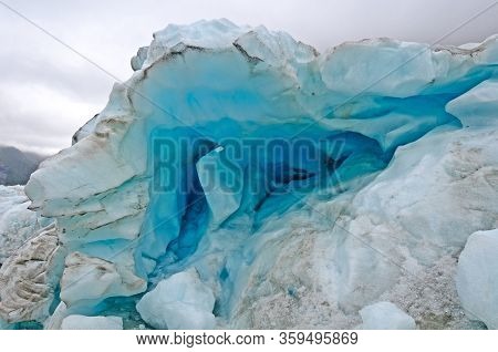 Blue Ice In A Glacial Serac On The Franz Josef Glacier In New Zealand