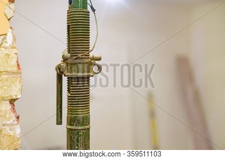 Close-up Of An Acrow Prop Or Steel Support Joist During Domestic Building Work