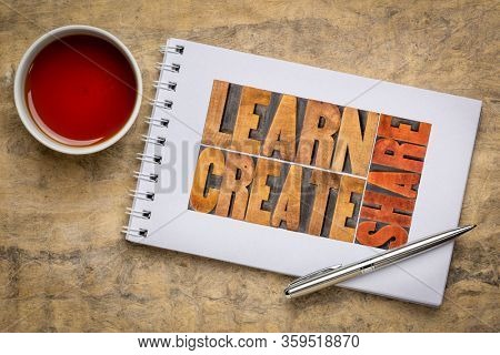 learn, create, share - workspace flat lay with blank spiral notebook, pen, and a cup of tea against handmade textured paper, learning, creativity, networking and teamwork concept