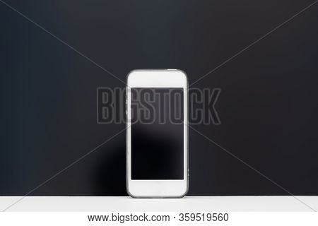 White Smartphone. Mobile Phone With Black Screen