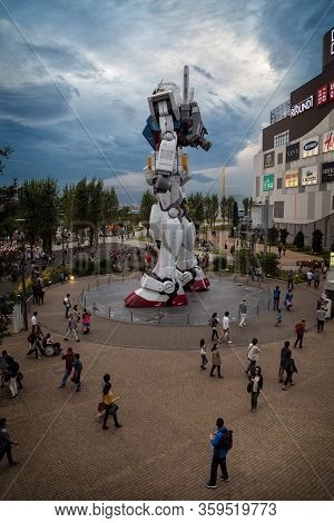Tokyo, Japan; October 29 2014: Gundam, The Giant Tokyo Robot Surrounded By Many People In The Diver 