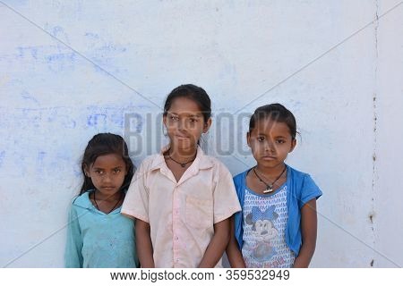 Tikamgarh, Madhya Pradesh, India - March 24, 2020: Group Of Happy Indian Little Village Girls Standi