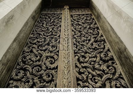 Close-up Of The Beautiful Wood Craving Door In Ayutthay Period Of Wat Don Sak In Laplae District Of 