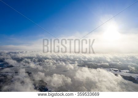 Aerial View Clouds Over Forest. Aerial View Of Forest And Clouds. Aerial Drone View Flying Over The