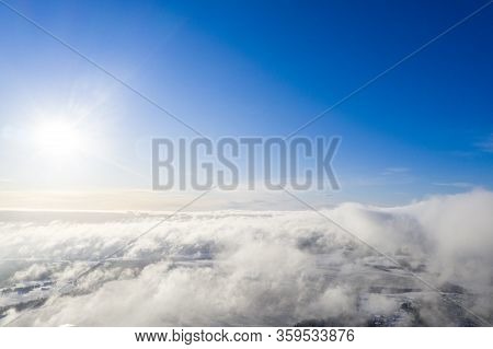 Aerial View Clouds Over Forest. Aerial View Of Forest And Clouds. Aerial Drone View Flying Over The