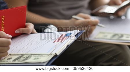 People Write Passport Details In Application Form. Briefing Before An Interview At Us Embassy. Payme