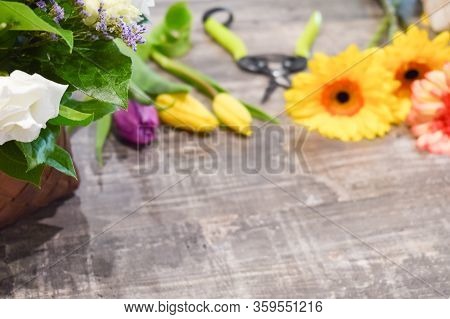 Store Flowers Background. Flower Delivery. Floral Design. Fresh Flowers On A Wooden Table.