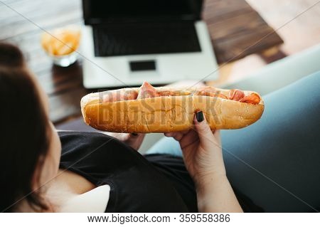 Mindless Snacking, Home Sedentary Lifestyle, Compulsive Overeating. Obese Lazy Woman Sitting On Sofa