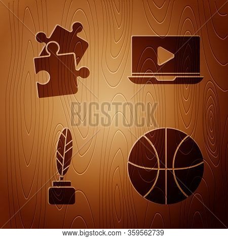 Set Basketball Ball, Piece Of Puzzle, Feather And Inkwell And Online Play Video On Wooden Background