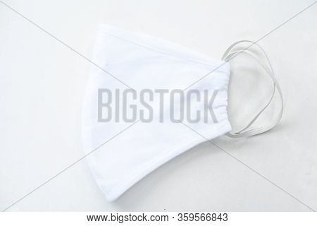 White Surgical Mask Personal Protective Equipment With Protec Coronavirus Or Covid-19 Virus.