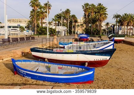 Salou Town, Spain - January 3, 2020: Colorful Fishing Boats On The Beach In Salou Town. Salou Is A P