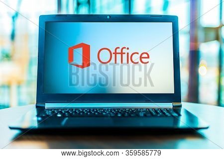 Poznan, Pol - Mar 24, 2020: Laptop Computer Displaying Logo Of Microsoft Office, A Family Of Client 