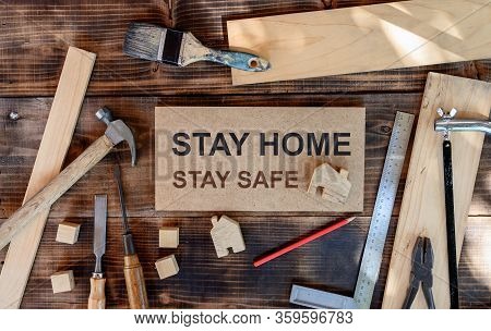 Wfh: Carpenter Working From Home. Stay Home Stay Safe Woodwork Concept. Social Distancing And Physic