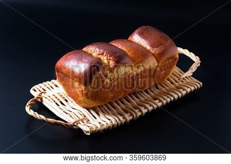 Food Baking Concept Fresh Baked Organic Homemade Soft Milk Loaf Bread In Loaf Pan On Wicker Bread Tr