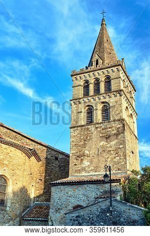 A Fragment Of The Stone Belfry Of The Medieval Church Of The City Of Aubenas In France