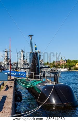 Stockholm, Sweden - June 7, 2013: Closeup View Of A Swedish Submarine And Warships In The Background