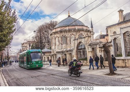 Istanbul, Turkey: Historical City Center And Tram Going Beside Of Mausoleum Of Sultan Mahmut Ii On B