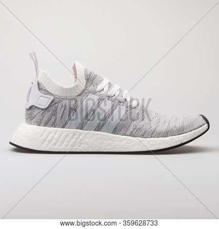 Vienna, Austria - August 6, 2017: Adidas Nmd R2 Pk White And Grey Sneaker On White Background.