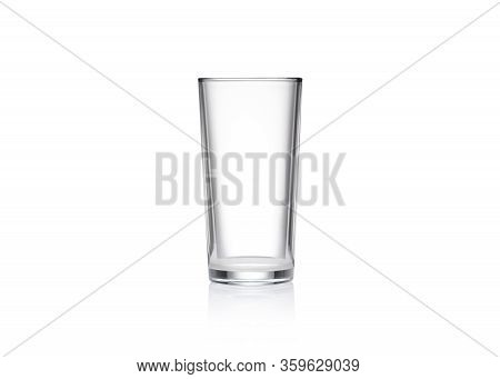 Empty Glass Of Glass On A White Background. Glass Cup Isolate Closeup. Glass On A Mirror Surface.