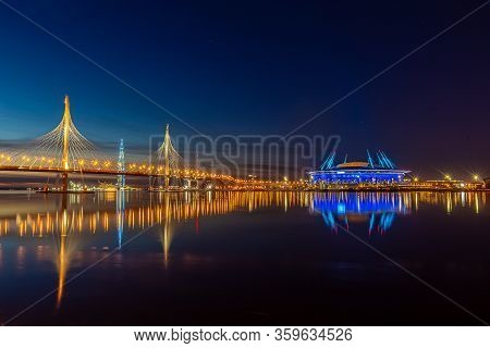 St. Petersburg, Russia, March 30, 2020. Lakhta Center And The Whsd Bridge At Sunset, Blue-yellow Ref