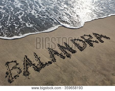 Balandra Text Handwritten In Beach Sand, Background And Texture