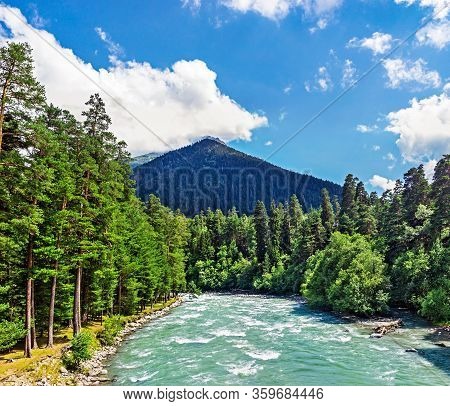 Bolshoy Zelenchuk River In The Caucasus Mountains On A Sunny Day