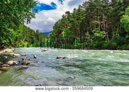 Bolshoy Zelenchuk River In The Caucasus Mountains On A Sunny Day