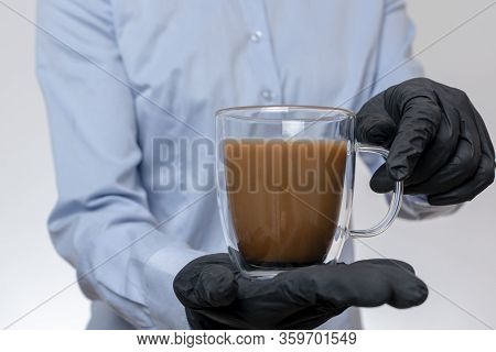 Office Woman In Blue Blouse Holding Coffee Cupin Hands