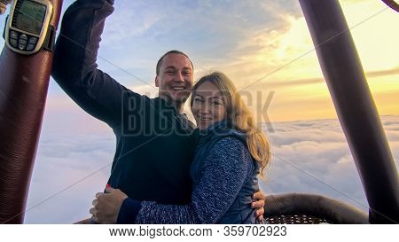 Adventure Love Couple On Hot Air Balloon Watermelon. Man And Woman Kiss Hug Love Each Other. Burner 