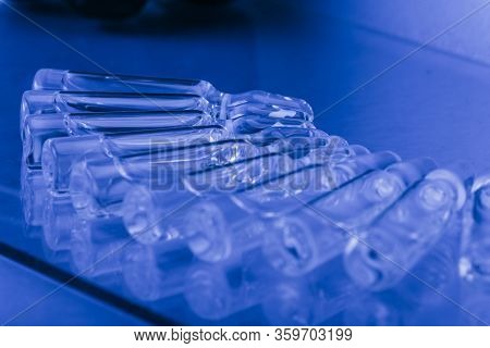 Glass Medical Ampoule Vial For Injection. Medicine Is Liquid Sodium Chloride With Of Aqueous Solutio