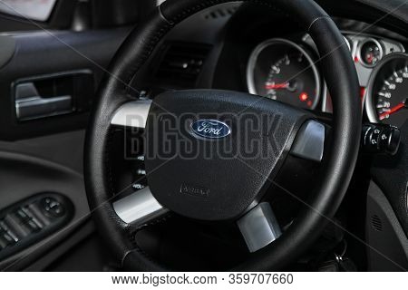 Novosibirsk, Russia - March 04, 2020:   Ford Kuga,  Auto Interior: Steering Wheel With Red Logo Ford