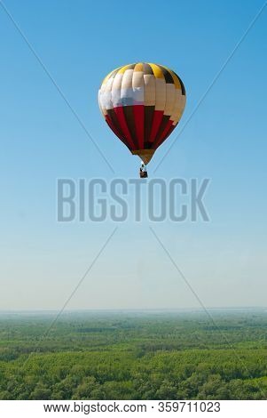Bright Balloon Against The Background Of Blue Sky.