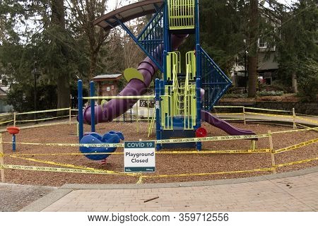 Deep Cove, Canada - April 1, 2020: View Of Sign Playground Closed Due To Covid-19(coronavirus) In Pa