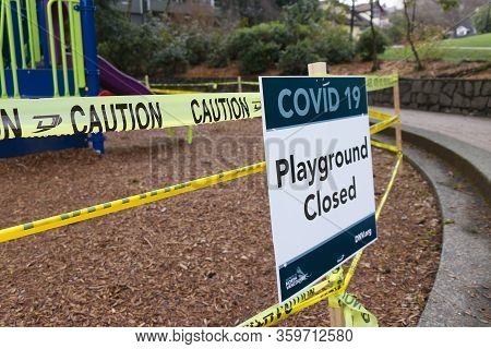 Deep Cove, Canada - April 1, 2020: View Of Sign Playground Closed Due To Covid-19(coronavirus) In Pa