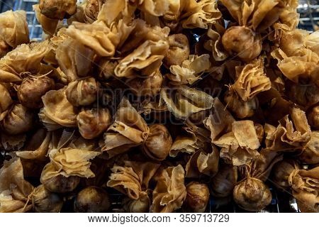 Thai Money Bag (thai Traditional Spring Rolls) Or Toong-tong Is Thai Food Or Thai Snack Are Royal Cu