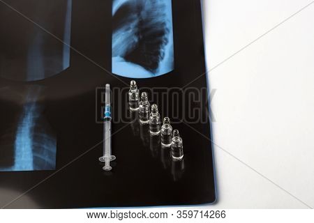 X-ray Film Thoracic Spine With Medical Face Mask. Concept Of Medical Service, Diagnosis And Treatmen