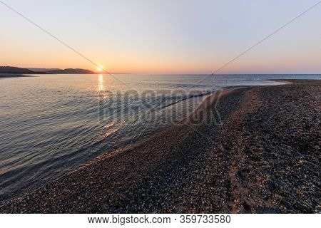 Sunrise In Possidi Cape Beach. Kasandra Peninsula. Greece