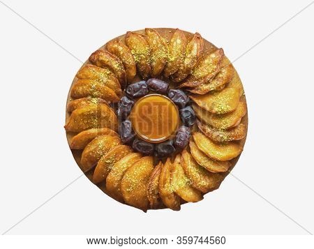 Isolated Arab Sweets. Arabian Pancake Stuffed With Sweet Cheese And Pistachios.
