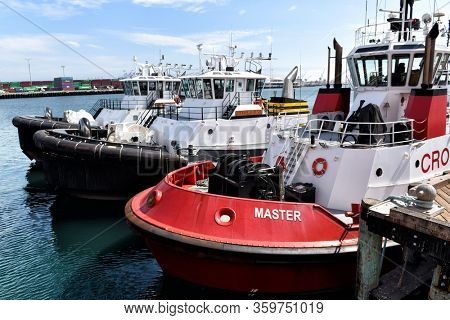 SAN PEDRO, CALIFORNIA - 06 MAR 2020: Tug boats at dock in the port of Los Angeles.