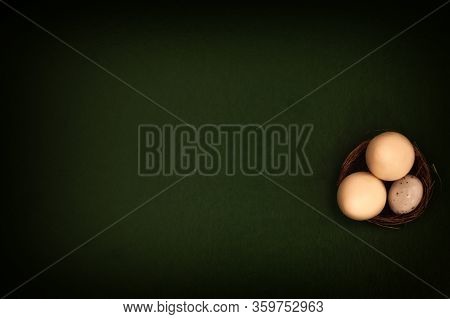 Eggs In A Basket On A Green Background. White Chocolate And White Speckled Eggs. Flat Lay, Copy Spac