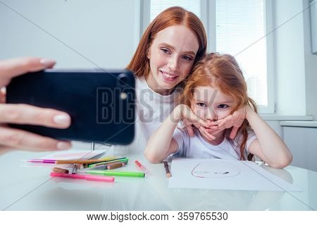 Redhaired Ginger Sisters Painting Together At House In The Morning And Kaking Selfie Photo On Camera