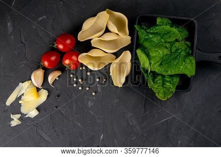 Pasta, Big Conchiglie And Fresh Vegetables. Ingredients For Italian Cuisine, Top View. Copy Space On