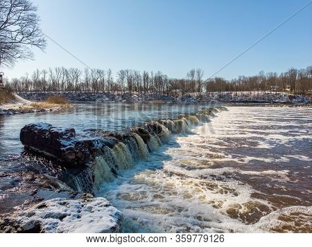 Warm Winter Day View Of Ventas Rumba Riverfall, The Wides Waterfall In Whole Europe. Photo Taken In 