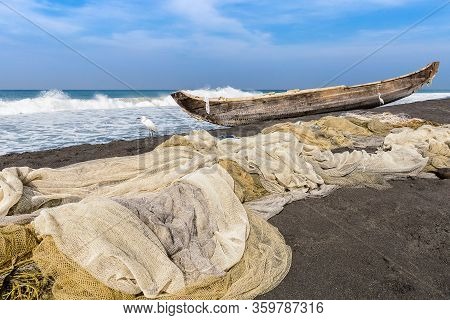 Fishing Net And Boat At Odayam Beach, Varkala, India.
