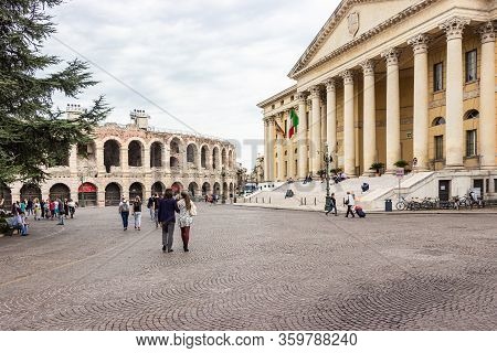 Verona, Italy, September 26, 2015 : Tourists Walking Around The Piazza Bra Square On A Cloudy Day, I