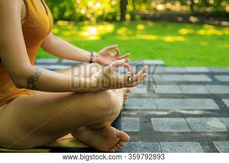 Yoga Lifestyle. Close Up Gyan Mudra. Lotus Pose. Young Woman Meditating, Practicing Yoga And Pranaya