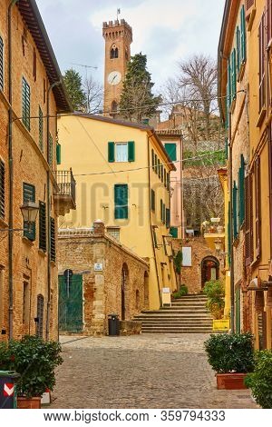 Old street and old bell tower in Santarcangelo di Romagna town, Emilia-Romagna, Rimini province, Italy