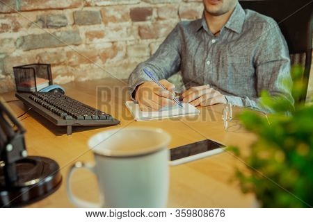 Close Up. Man Working From Home During Coronavirus Or Covid-19 Quarantine, Remote Office Concept. Yo
