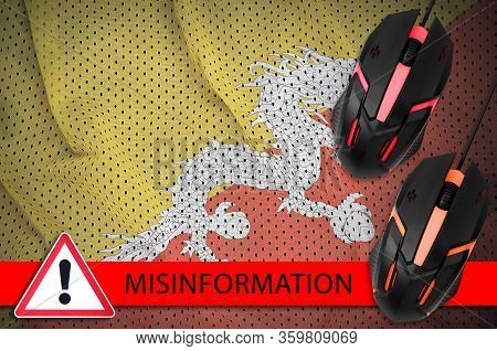Bhutan Flag And Two Computer Mouses. Misinformation During Coronavirus Or 2019-ncov Virus Concept